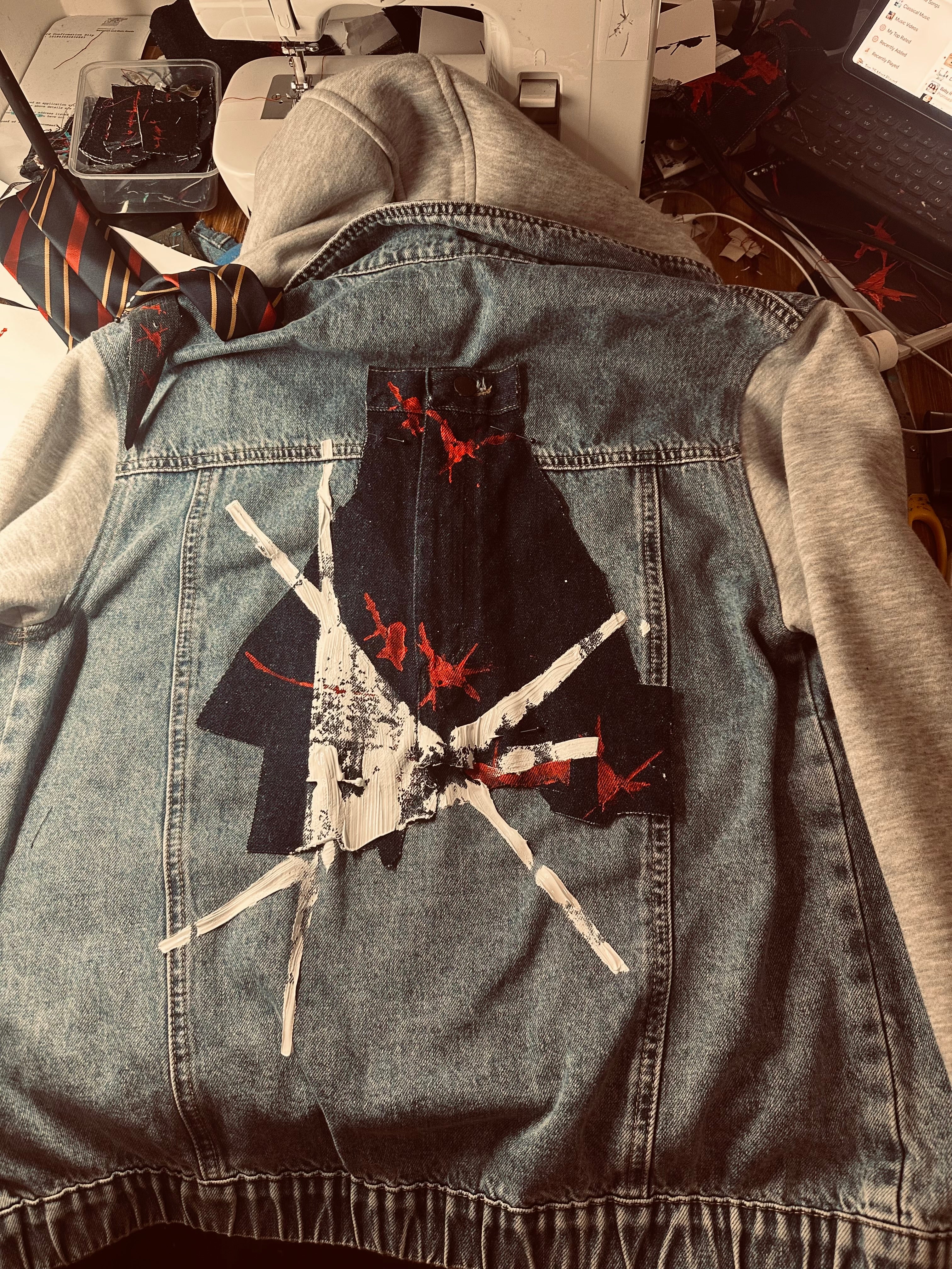 reclaimed jacket embellished with paint and thread by Jay Jackal 